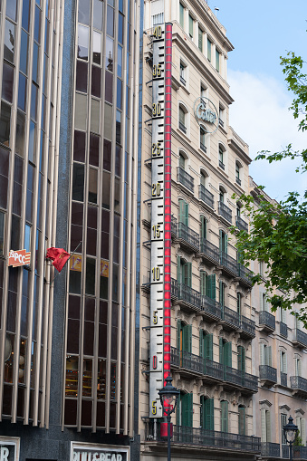 BARCELONA, SPAIN - MAY 2017: Architecture of Barcelona town with big thermometer mounted on a wall of building