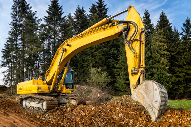 istock Yellow excavator on highway construction S7, Naprawa, Poland 698163580