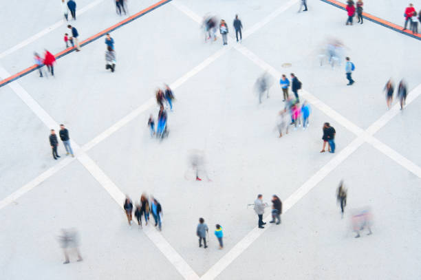 istock People motion blur, aerial view 698173702