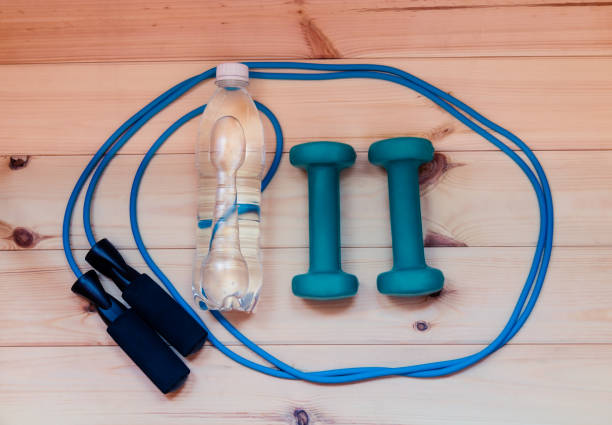 istock Dumbbells, bottle of water and skipping rope 698178974