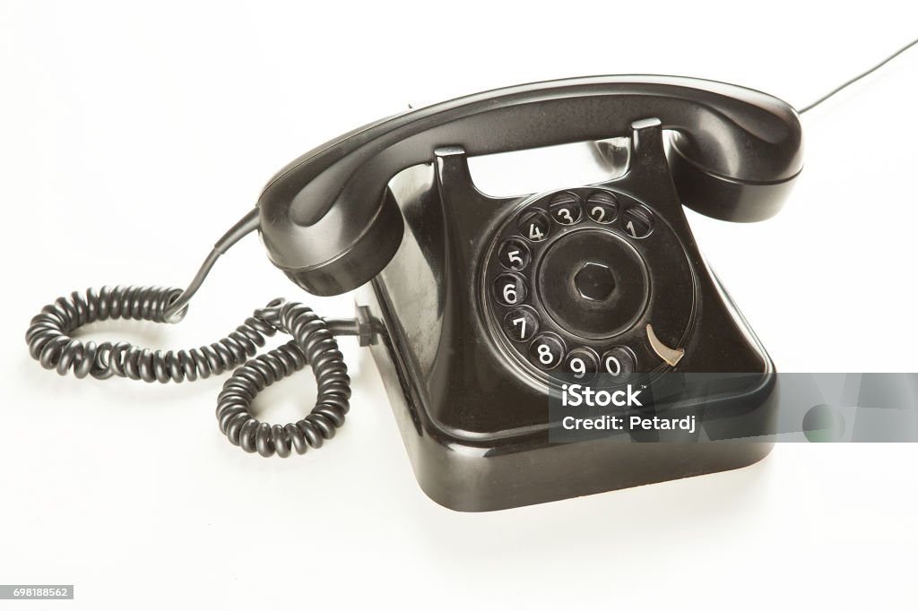 Antiguo teléfono rotativo sobre fondo blanco - Foto de stock de Anillo - Joya libre de derechos
