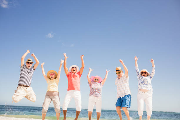 istock Happy senior friends jumping 698188842