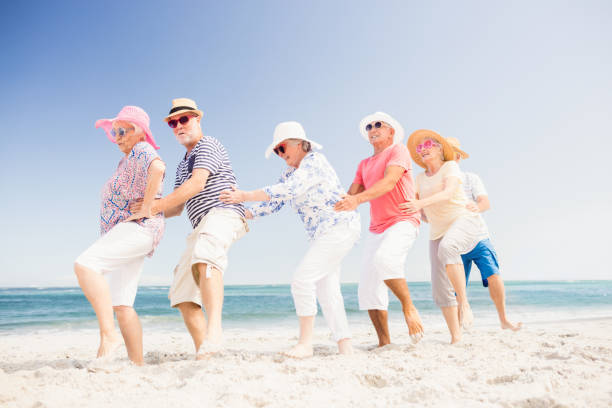 istock Happy senior friends dancing 698189242