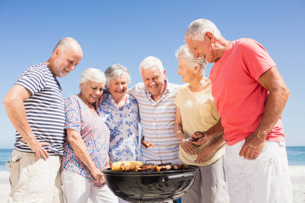 istock Senior friends having a barbecue 698190078