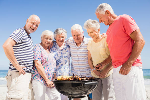 istock Senior friends having a barbecue 698190278