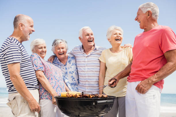 istock Senior friends having a barbecue 698190950
