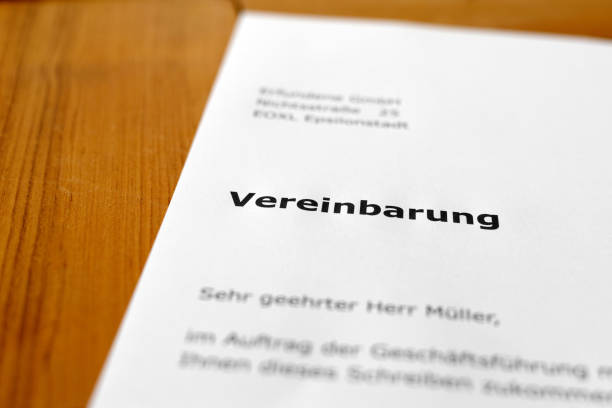 istock A letter on a wooden desk - Agreement 698196990