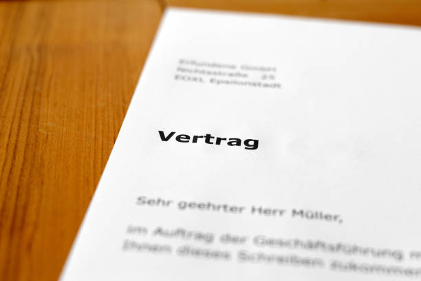 istock A letter on a wooden desk - contract 698197184