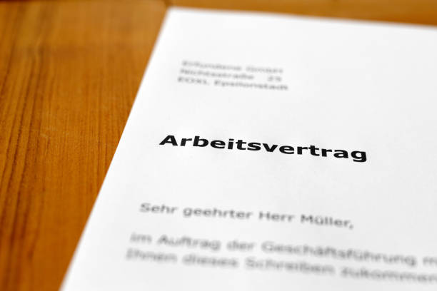 istock A letter on a wooden desk -employment agreement 698199450