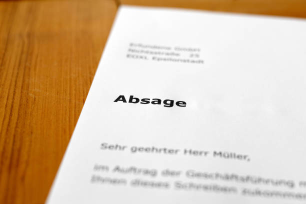 istock A letter on a wooden desk - application rejection 698202164
