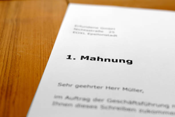 istock A letter on a wooden table - first warning 698202722