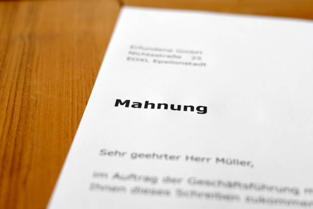 istock A letter on a wooden table - warning 698205758