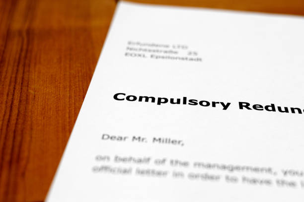 istock A letter on a wooden table - compulsory redundancy 698206314