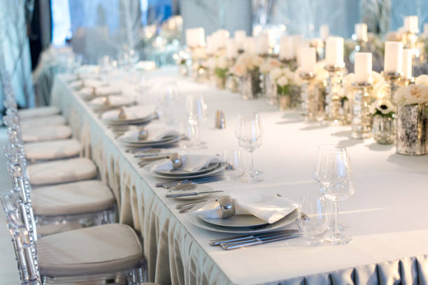 istock Banquet table decor. Candles in vases and flowers 698206650