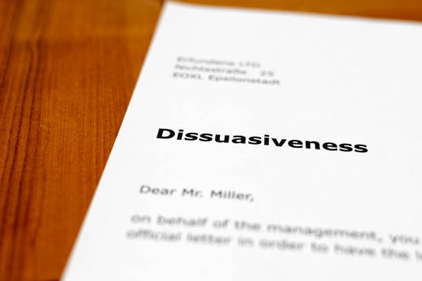 istock A letter on a wooden desk - dissuasiveness 698209186