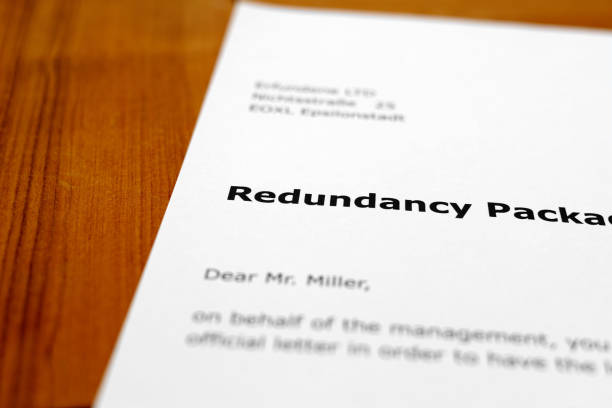 istock A letter on a wooden desk -  redundancy package 698210926