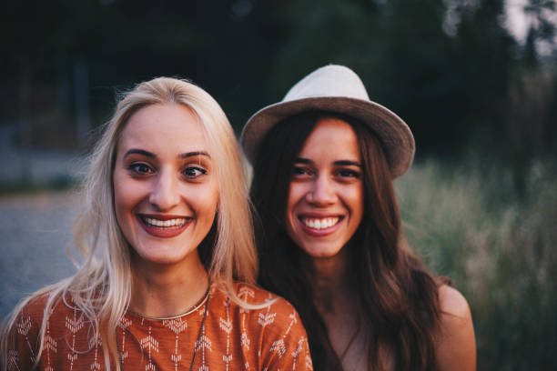istock Two millennial girl goofing arounf 698217318