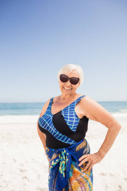 istock Senior woman with hands on hips 698231064