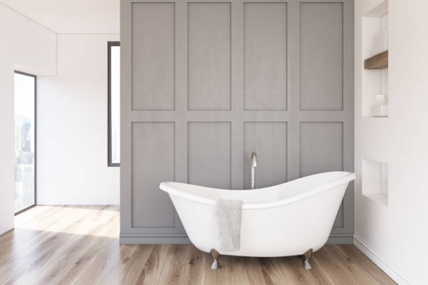 istock Gray bathroom, white tub 698246954