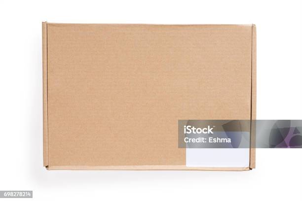 Closed Cardboard Box With Blank White Label Isolated On White Clipping Path Included Stock Photo - Download Image Now