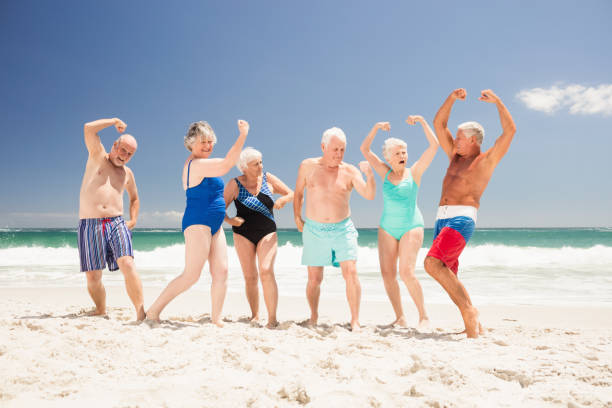 istock Senior friends showing their muscles 698286290
