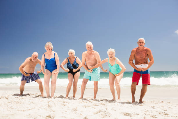 istock Senior friends showing their muscles 698286652