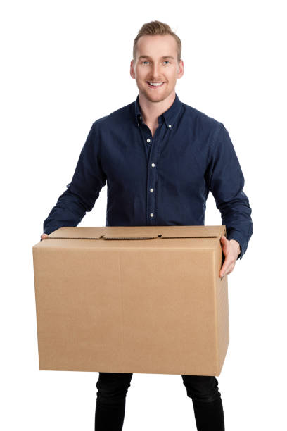 istock Blonde man with cardboard box smiling 698315304