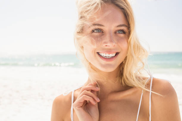 istock Beautiful smiling blonde woman 698315624