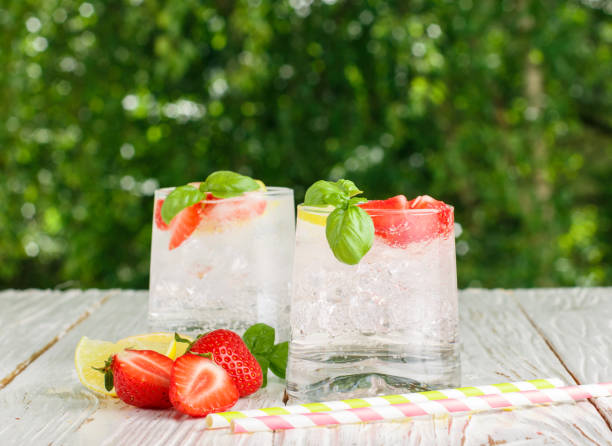istock Summer a refreshing lemonade. Drink with lemon, strawberries, mint, Basil and ice. Detox. Mineral water. Selective focus 698326256