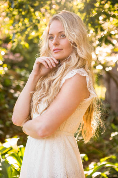 istock Beautiful woman looking away 698333026