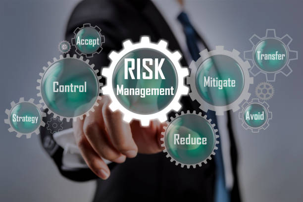Risk Management Concept on Businessman pointing at risk management concept on screen risk stock pictures, royalty-free photos & images