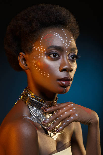istock Beautiful afro girl with drawings on skin 698348372