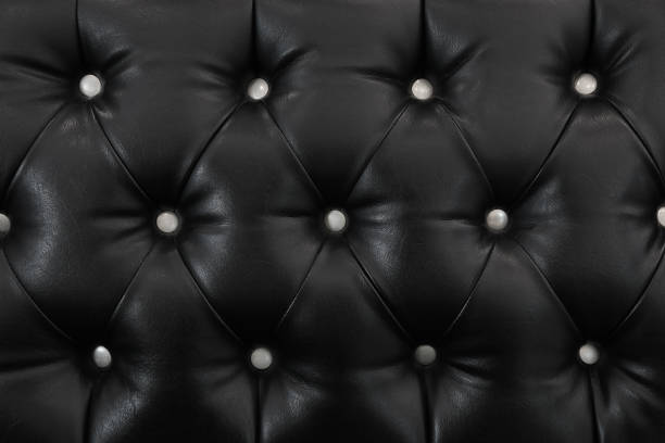 textura de couro preto elegante com botões brancos para design e plano de fundo - car leather hide seat - fotografias e filmes do acervo