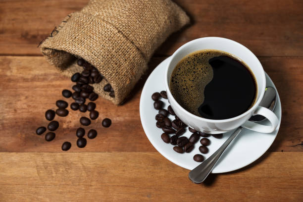 istock Vintage coffee bean on brown wooden 698355012