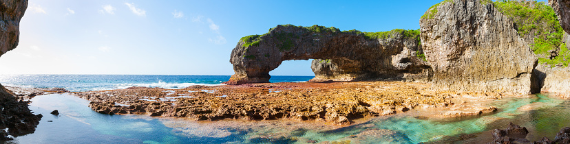Scenic natural arch on coast of island Talava Arch, Niue