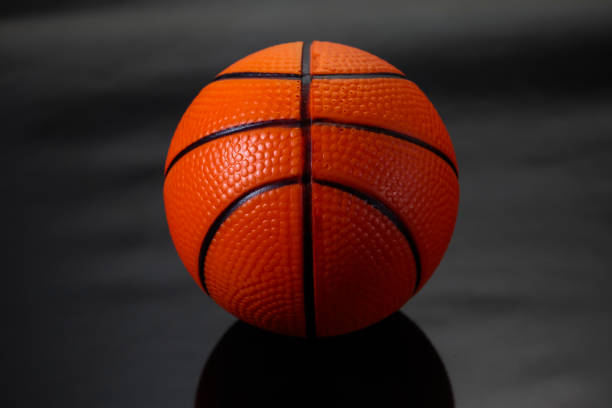 istock Ball basketball on black background. 698379138