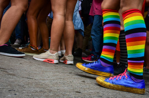 LGBT Rainbow Color socks Rainbow Color socks commemorating LGBT parade with various shoes and tennis styles sao paulo gay pride parade stock pictures, royalty-free photos & images