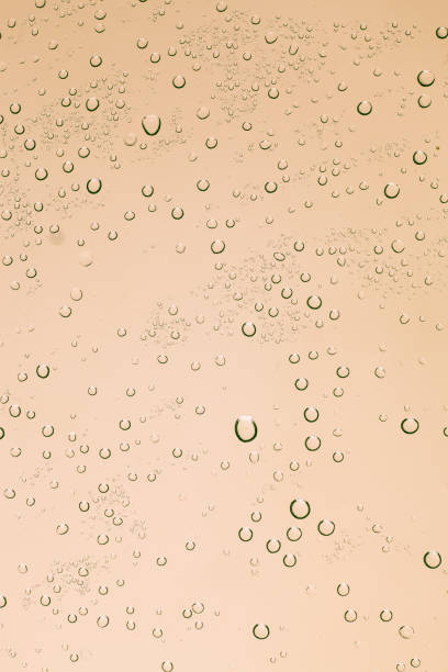 istock Rain droplets on glass background, Drops of water. 698388974