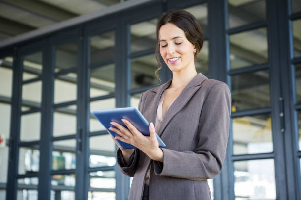 istock Young businesswoman in office 698411072