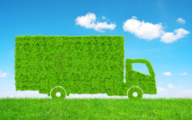 istock Green Truck in grass. 698421534
