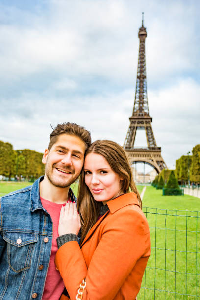 istock Romantic Young Couple With The Eiffel Tower in Paris 698421666