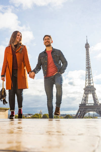 istock Romantic Young Couple With The Eiffel Tower in Paris 698421676