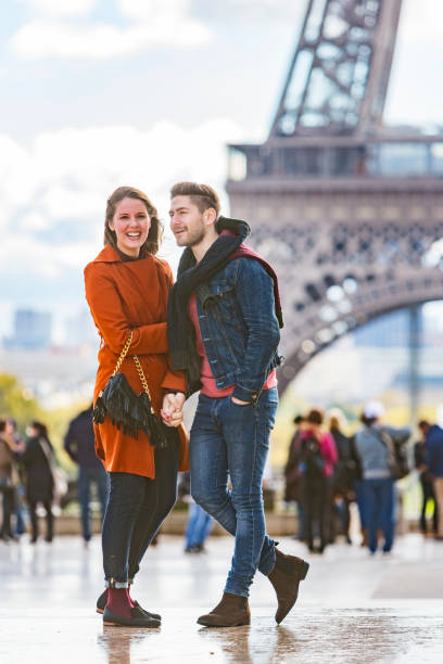 istock Romantic Young Couple With The Eiffel Tower in Paris 698421678