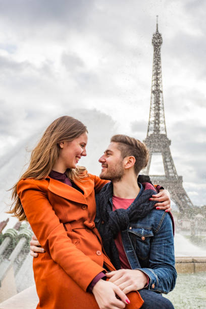 istock Romantic Young Couple With The Eiffel Tower in Paris 698421698