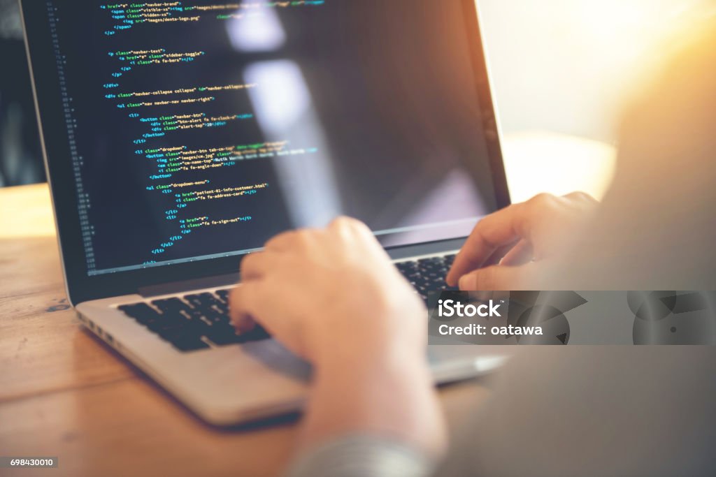 Development web, developer. Woman hands coding html and programming on screen laptop, development web, developer. Coding Stock Photo