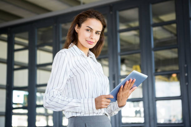 istock Young businesswoman in office 698430230