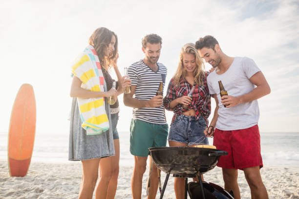 istock Happy friends preparing barbecue 698444522