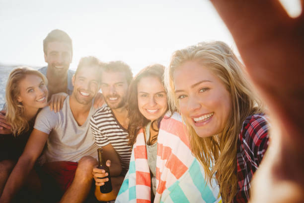 istock Happy friends taking selfie with smartphone 698447924