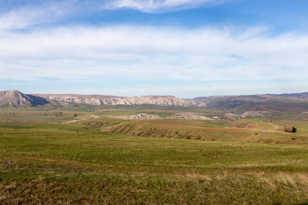 istock Steppes and mountains in Kazakhstan as a background 698460520