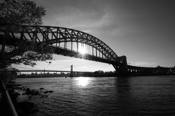 istock The Hell Gate Bridge and Triborough bridge over the reflective river in black and white style, New York 698467728